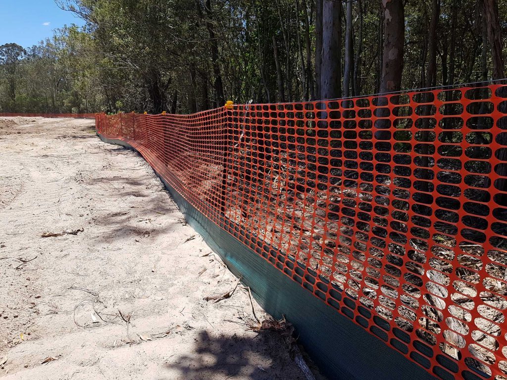 Fauna exclusion fencing protecting a wildlife corridor - photo 3