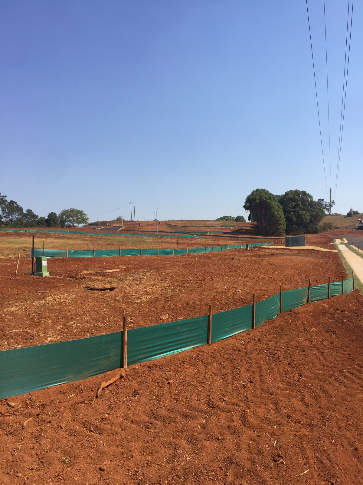 Silt fencing controlling sediment runoff on a construction site - photo 2